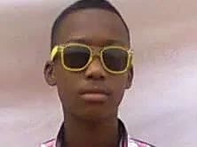 Reagan as a child wearing yellow sunglasses